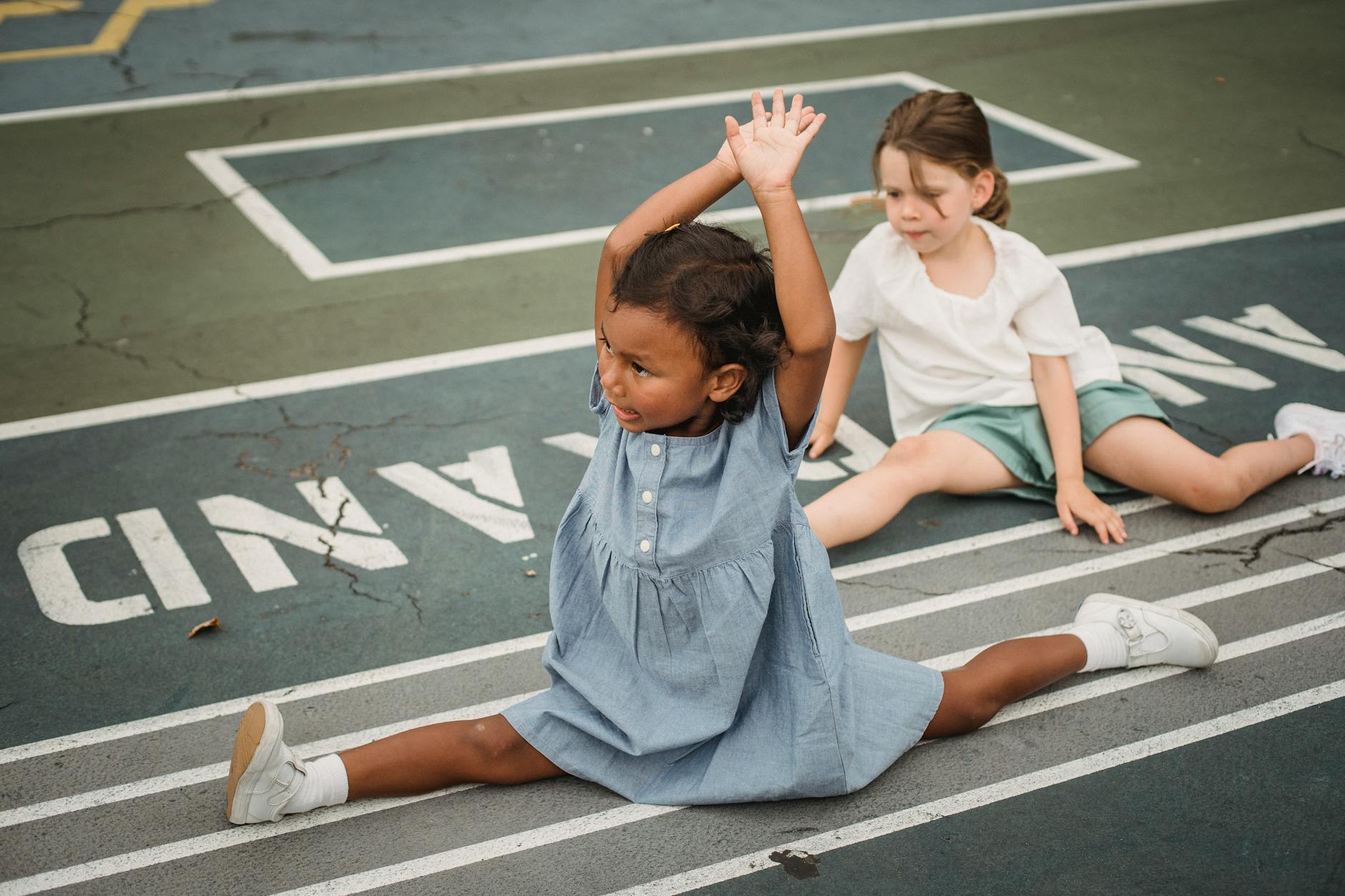 Family enjoying outdoor active play with kids in a sunny backyard — what outdoor play actually looks like for toddler